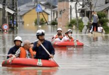 Residents are rescued by boat in Kurashiki, Okayama prefecture, western Japan